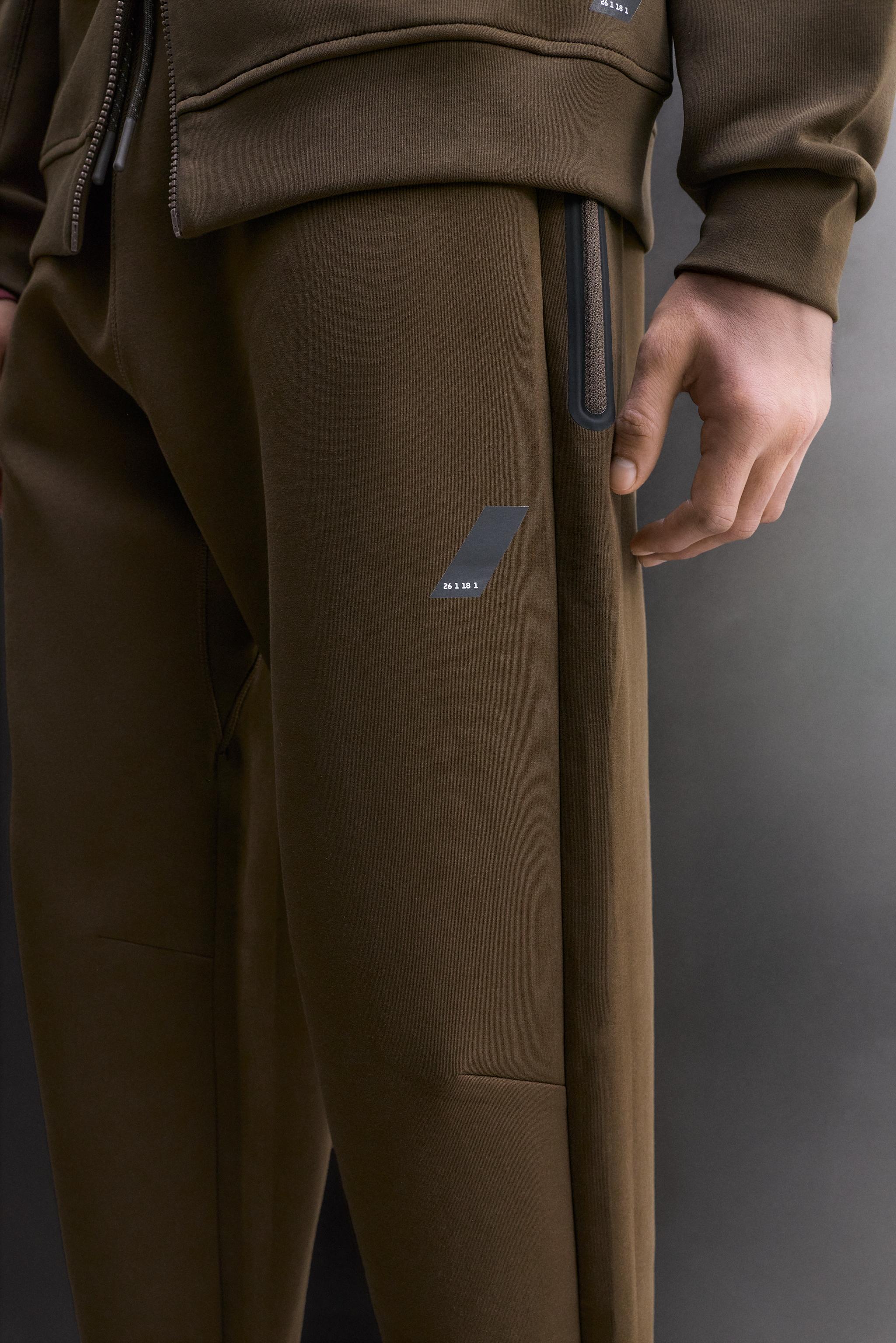 PANTALON TECHNIQUE À FERMETURE ÉCLAIR